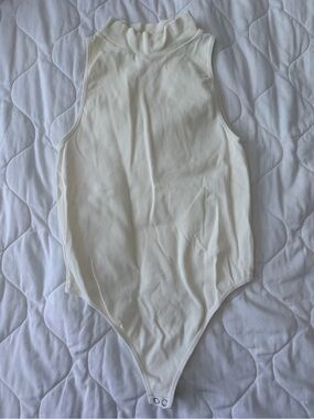 Cream Ribbed Mock-Neck One-Piece Bodysuit